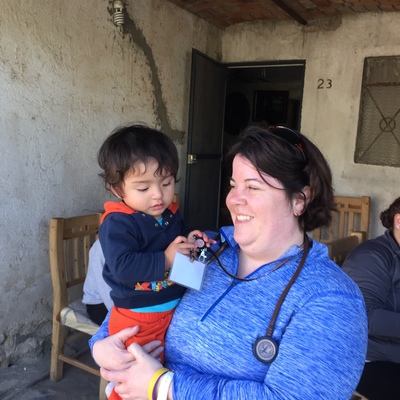 Dorothy Herring, RN, graduate of JCCC, on a medical mission.